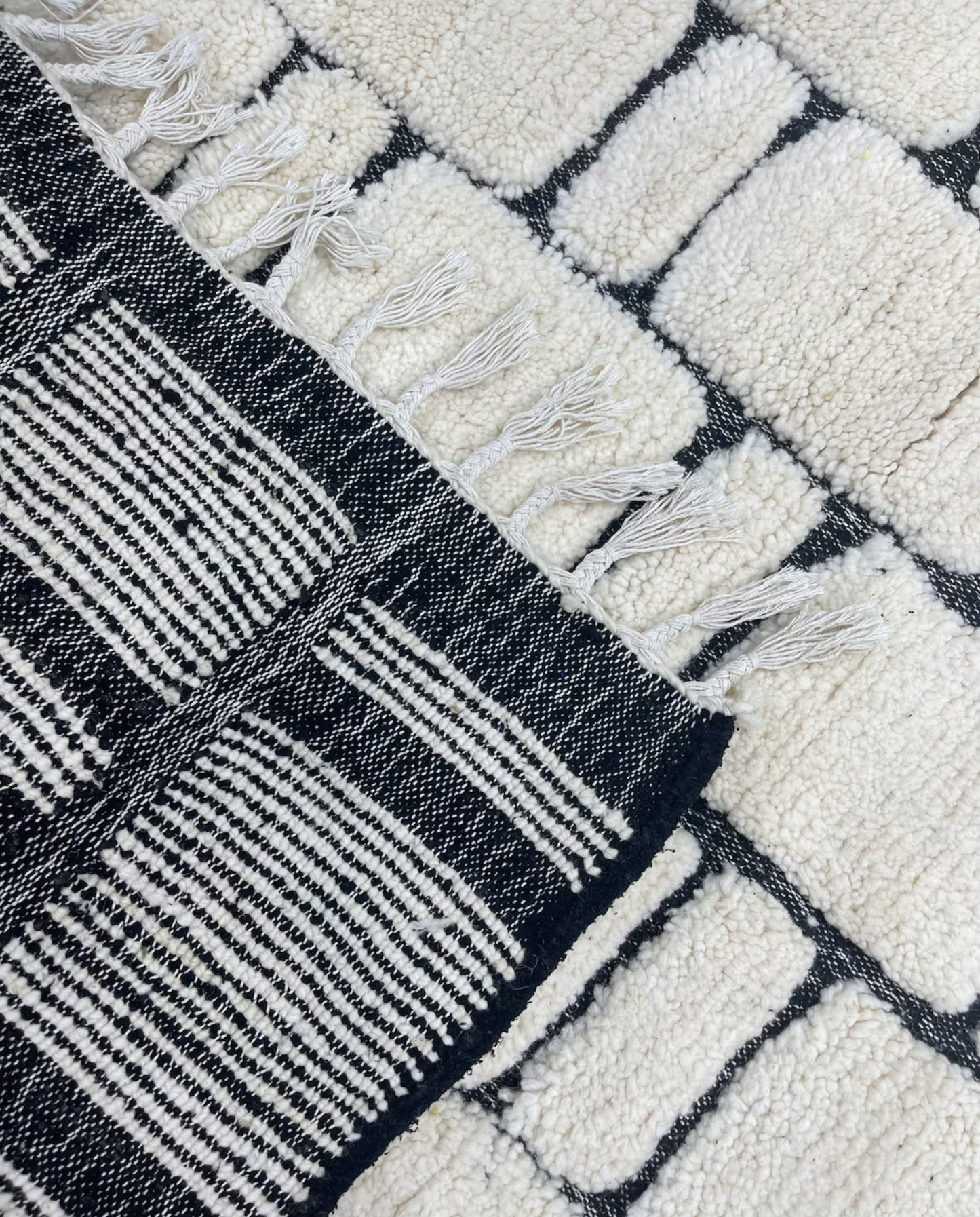 MERIEM Beni Ourain ivory abstract block grid Moroccan rug back view showing traditional handwoven construction, by NURA