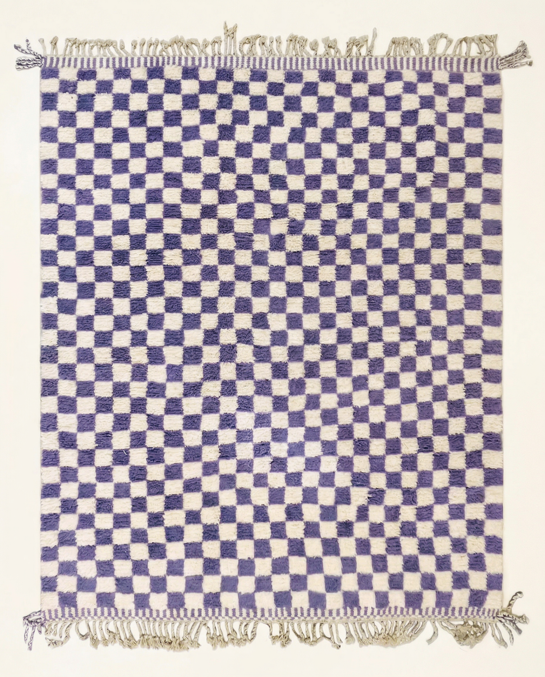 Plush cream and violet Beni Ourain Moroccan rug with a bold checker grid and high pile, by NURA.