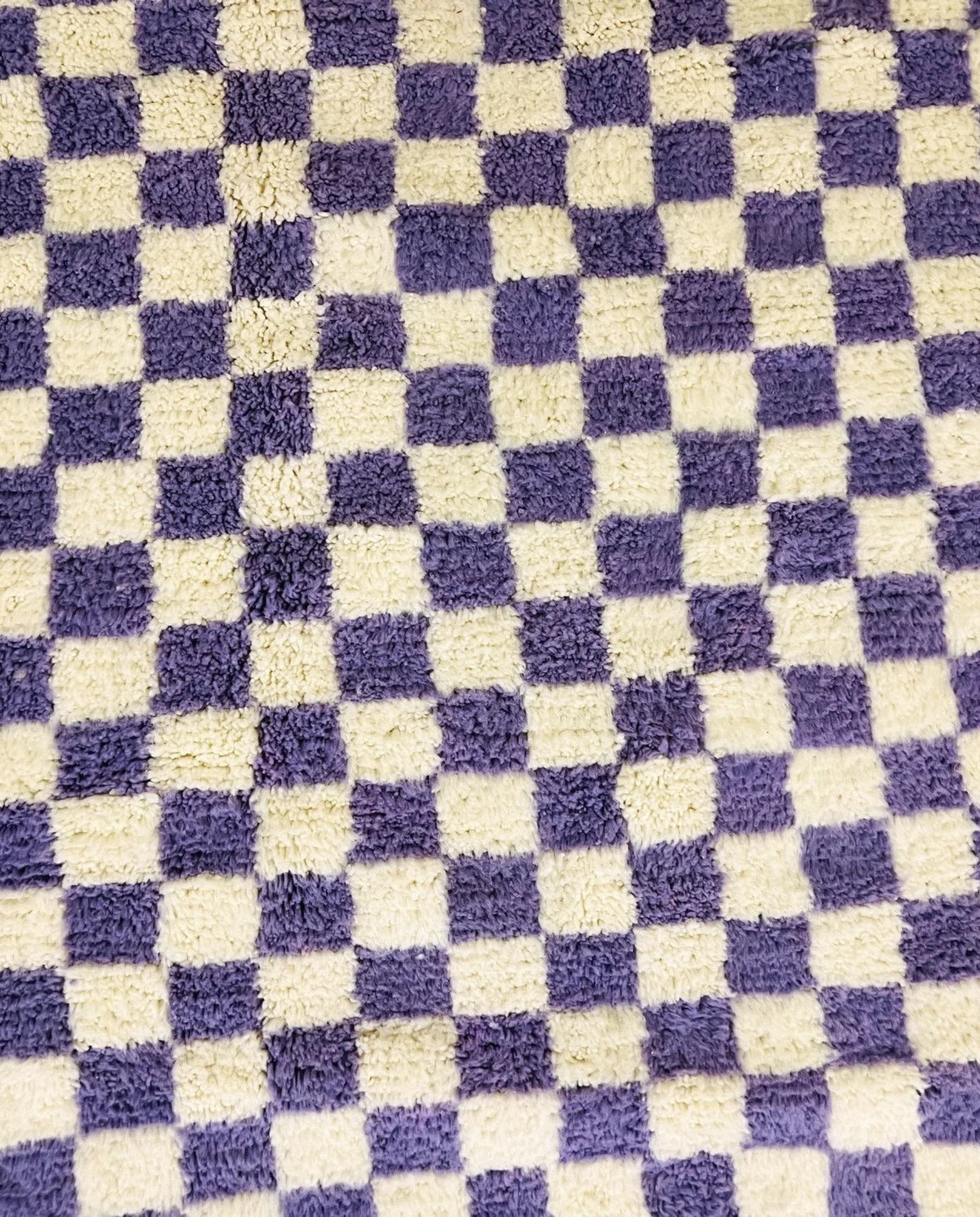 MOUNA Beni Ourain violet checker grid Moroccan rug close-up showing hand-knotted wool texture and pile detail 1, by NURA