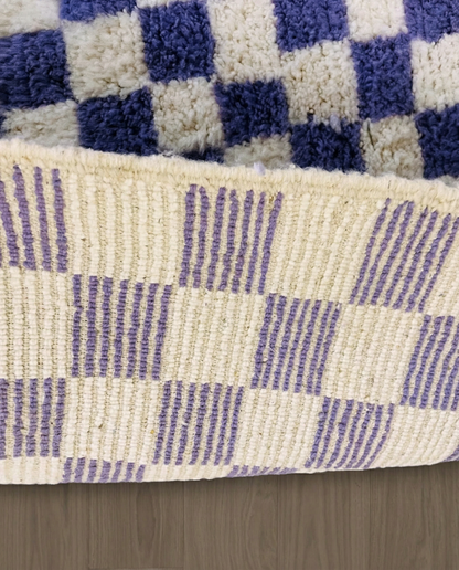 MOUNA Beni Ourain violet checker grid Moroccan rug close-up showing hand-knotted wool texture and pile detail 2, by NURA