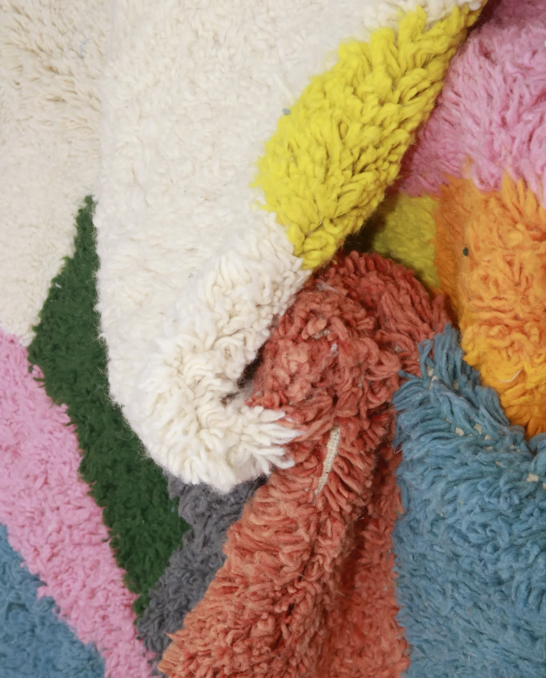 MUNIKA Azilal cream color block Moroccan rug close-up showing hand-knotted wool texture and pile detail, by NURA