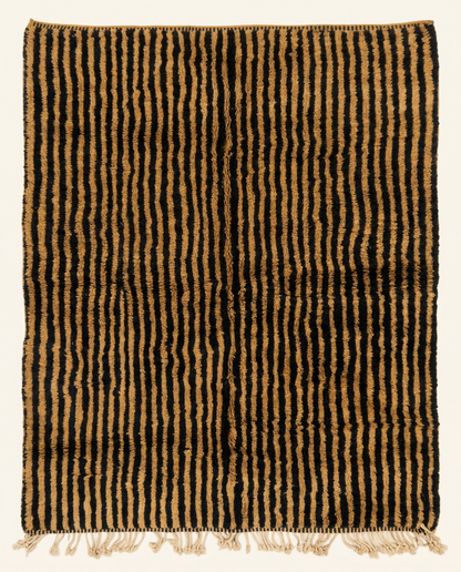 Plush camel and black Beni Ourain Moroccan rug with bold horizontal stripes and a thick high pile, by NURA.