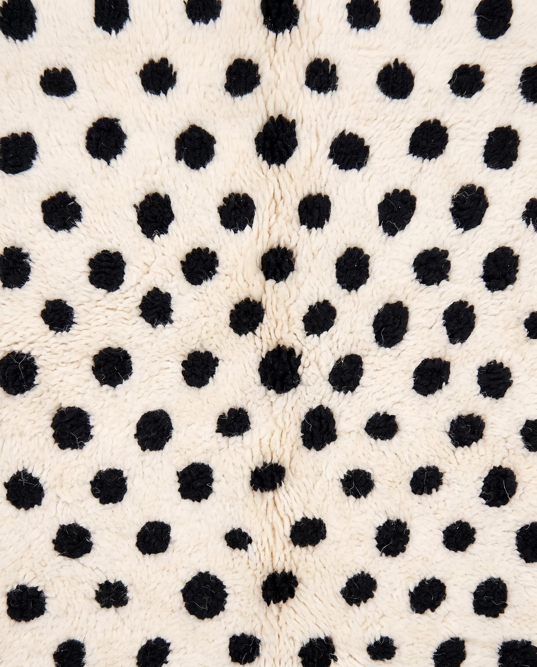 NAFISSA Azilal cream color block dots Moroccan rug close-up showing hand-knotted wool texture and pile detail, by NURA