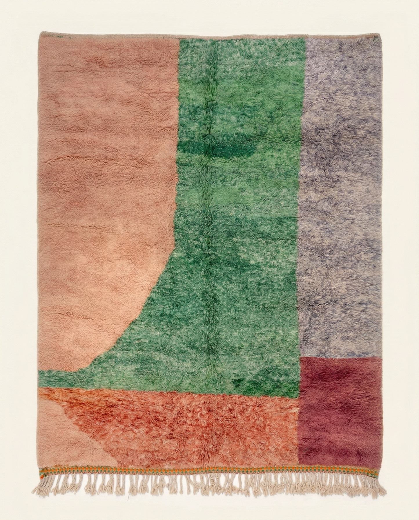 Plush multicolor Azilal Moroccan rug with bold abstract color blocks in green, peach, and burgundy, by NURA.