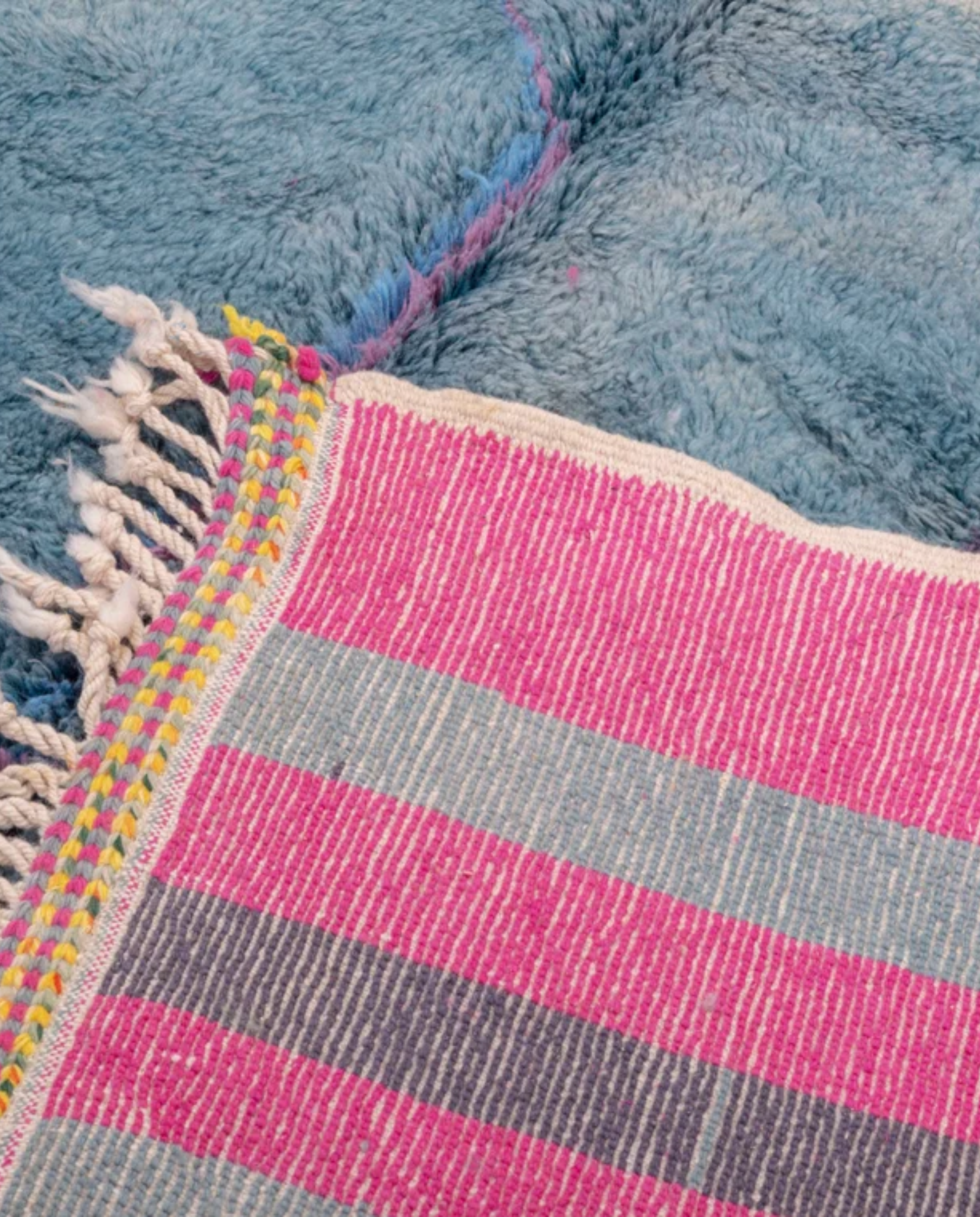 NAJIA Azilal slate blue painterly abstract field Moroccan rug back view showing traditional handwoven construction, by NURA