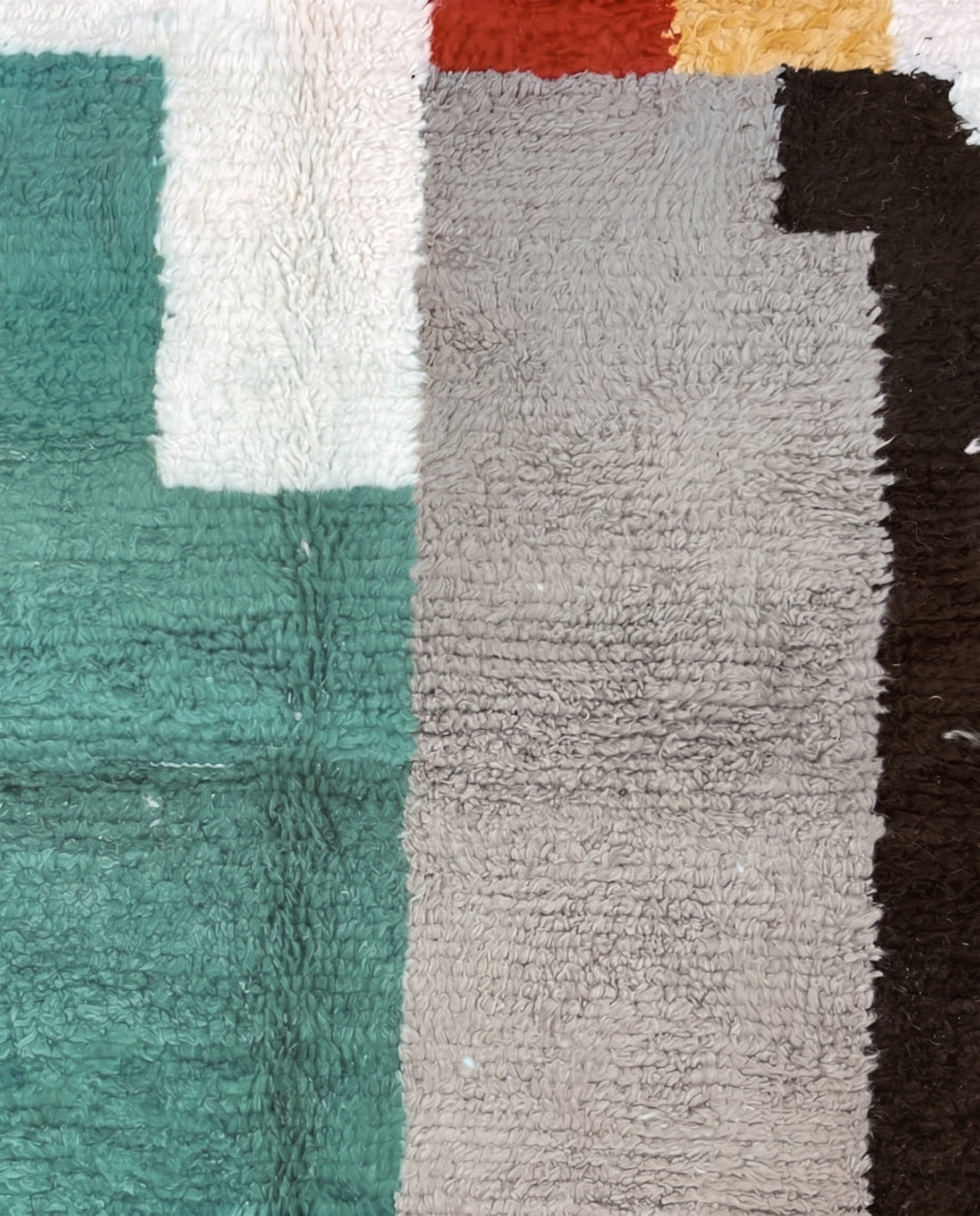 NARIMANE Azilal cream organic abstract Moroccan rug close-up showing hand-knotted wool texture and pile detail 1, by NURA