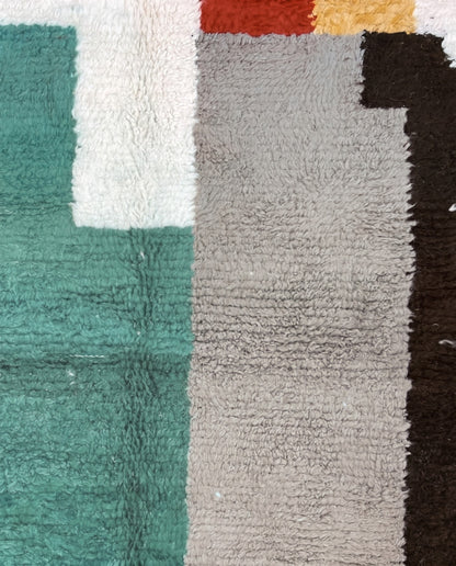 NARIMANE Azilal cream organic abstract Moroccan rug close-up showing hand-knotted wool texture and pile detail 1, by NURA