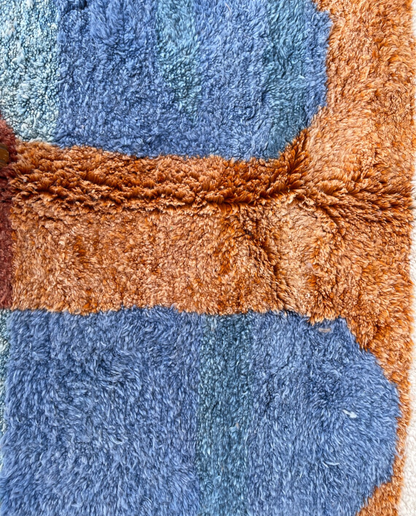 NARJISS Beni Ourain cream abstract color block Moroccan rug close-up showing hand-knotted wool texture and pile detail 1, by NURA