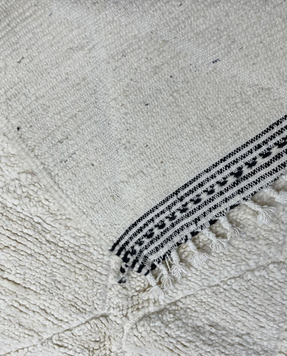 NASSIRA Beni Ourain cream diamond lattice Moroccan rug back view showing traditional handwoven construction, by NURA