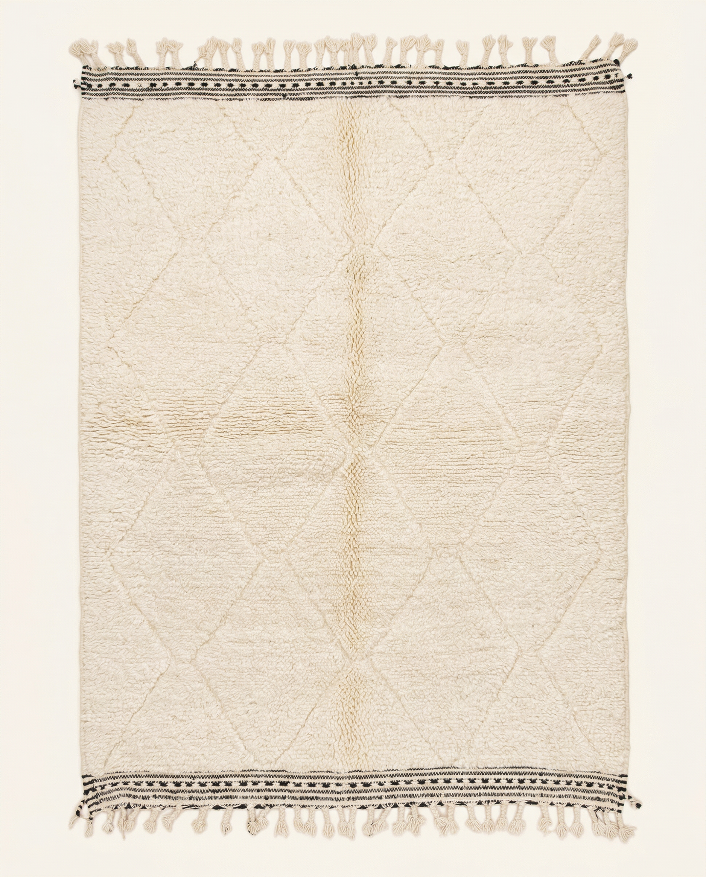 Plush cream Beni Ourain Moroccan rug with a sparse diamond lattice and flat-woven striped end bands, by NURA.
