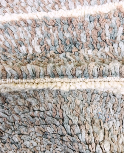 NESRINE Beni Ourain taupe broken stripe Moroccan rug close-up showing hand-knotted wool texture and pile detail 2, by NURA