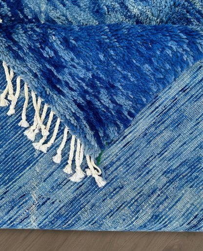 NOUHA Beni Ourain cobalt diamond lattice Moroccan rug back view showing traditional handwoven construction, by NURA