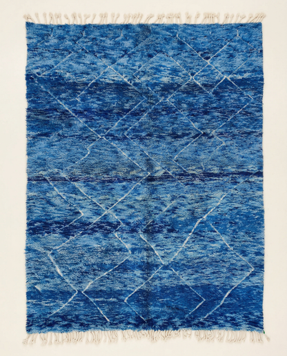 Plush cobalt blue Beni Ourain Moroccan rug with a large white diamond lattice and high pile, by NURA.