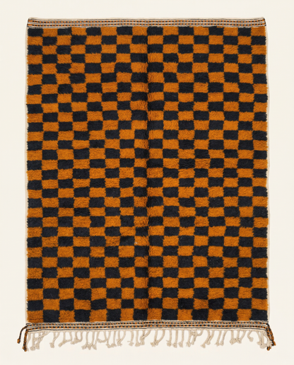 Plush burnt orange and black Beni Ourain Moroccan rug with a bold checkerboard pattern and high pile, by NURA.