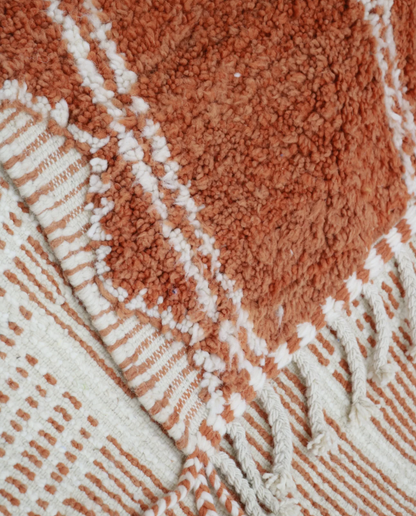 NUJA Boujad terracotta organic abstract Moroccan rug close-up of hand-tied fringe and kilim band detail 1, by NURA