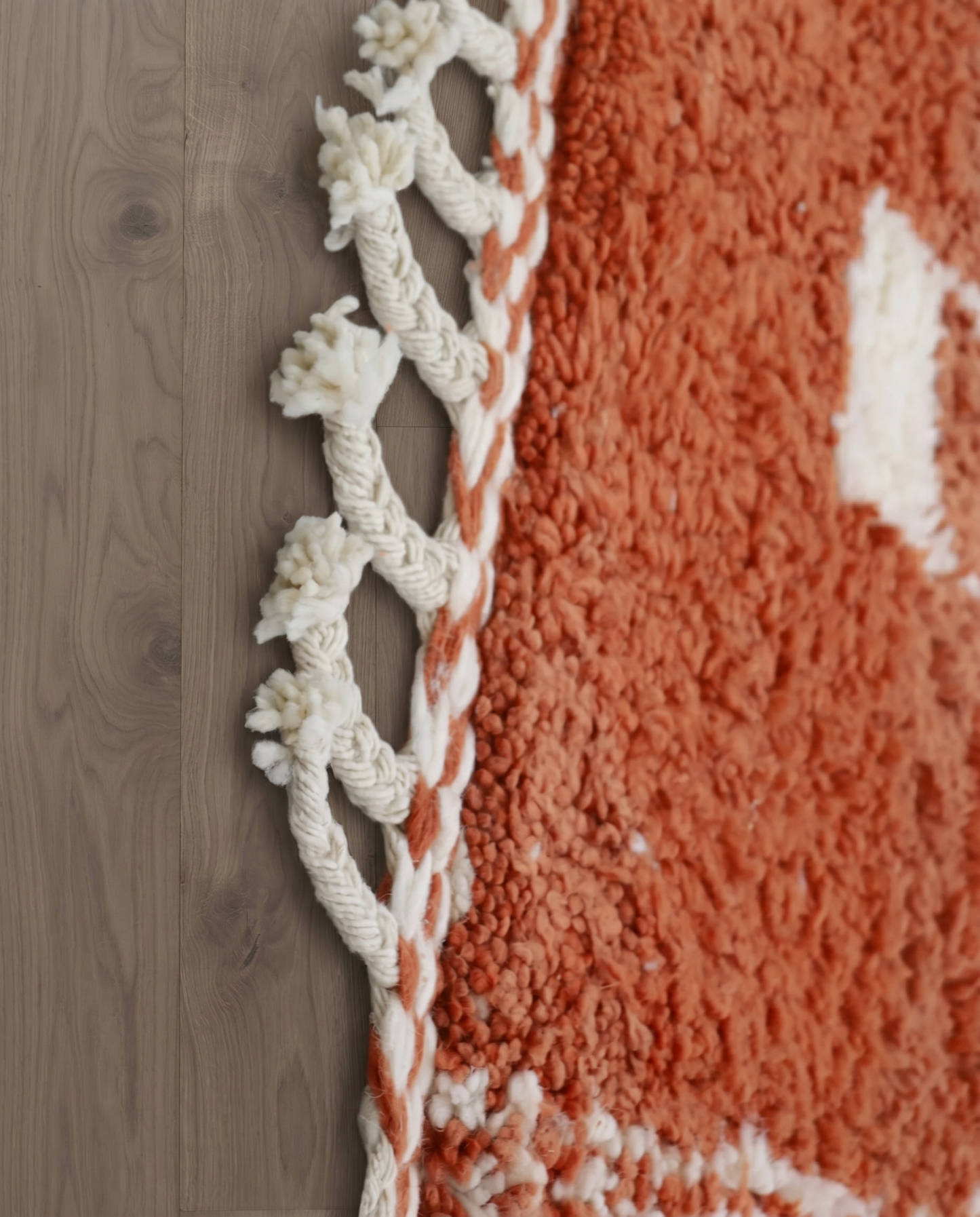 NUJA Boujad terracotta organic abstract Moroccan rug close-up of hand-tied fringe and kilim band detail 2, by NURA