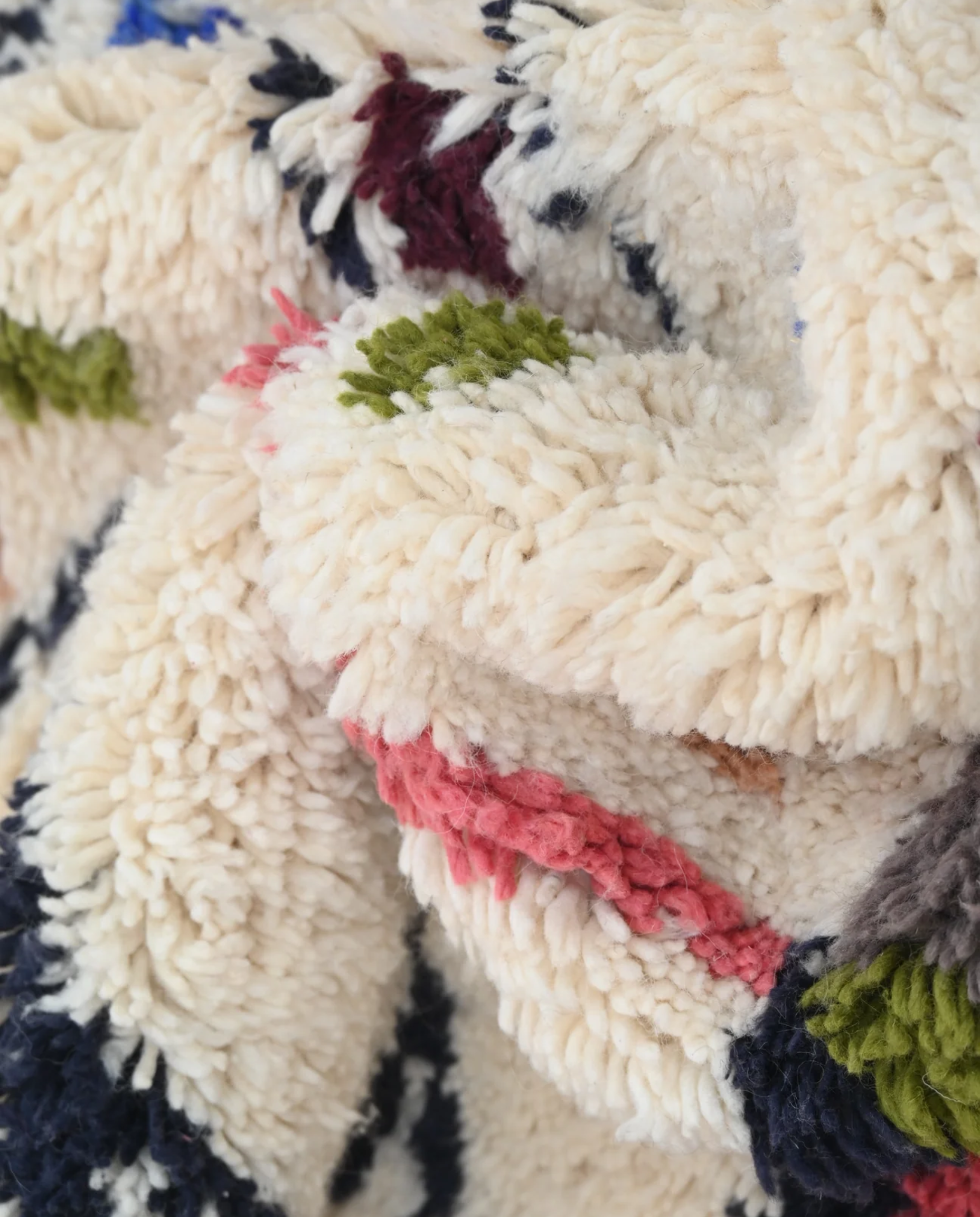 OULA Azilal cream organic abstract Moroccan rug close-up showing hand-knotted wool texture and pile detail 2, by NURA