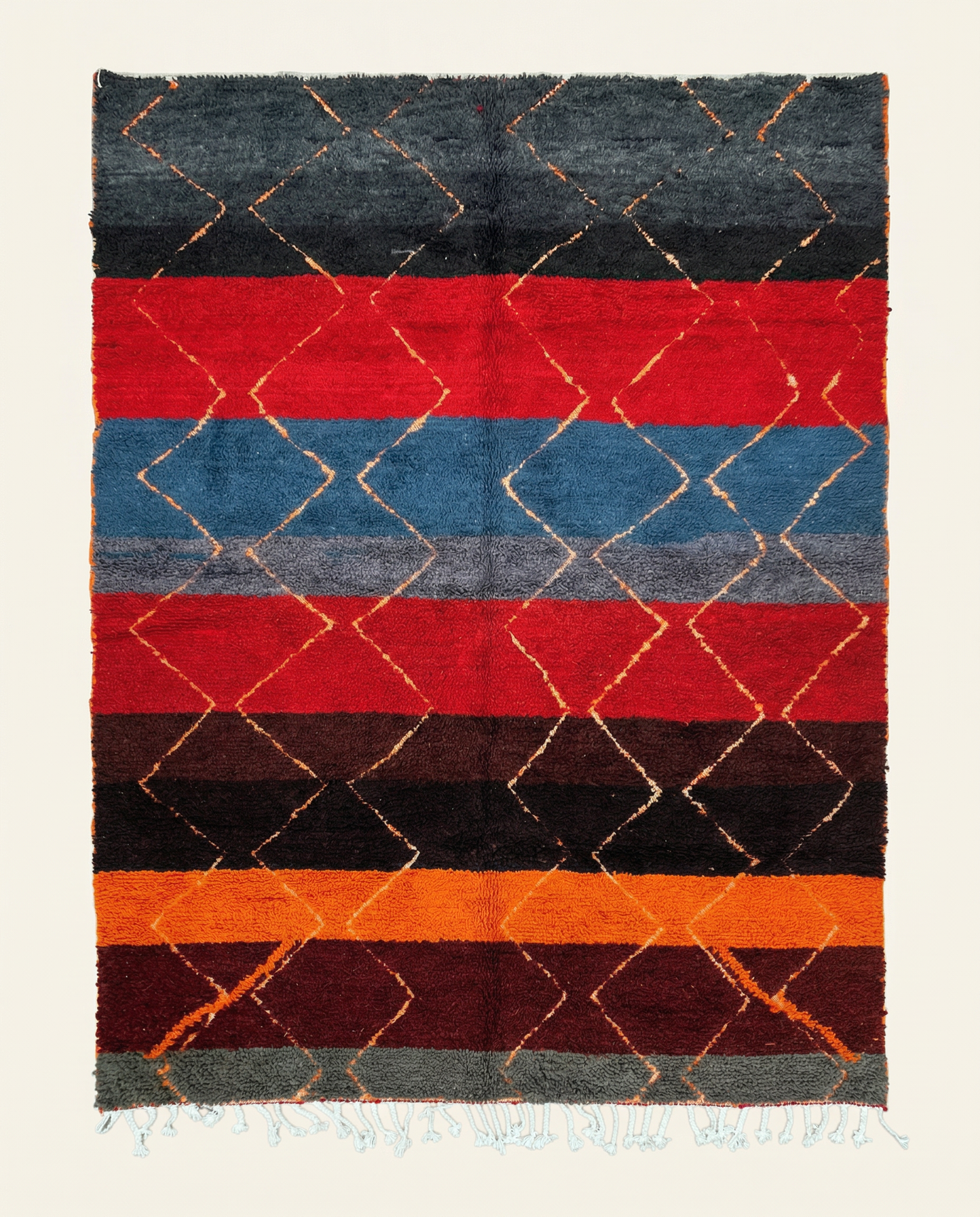 Plush multicolor Azilal Moroccan rug with bold horizontal bands and a large diamond lattice, by NURA.