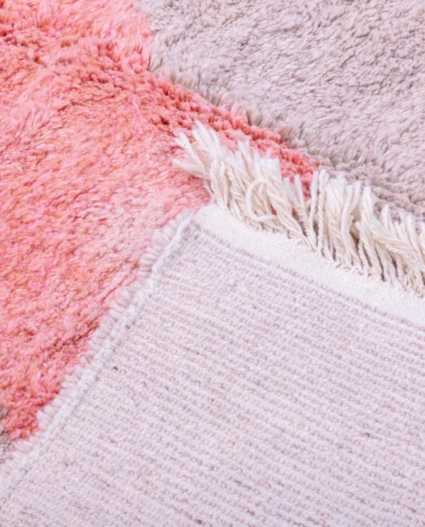 RADIA Azilal cream abstract color block Moroccan rug back view showing traditional handwoven construction, by NURA