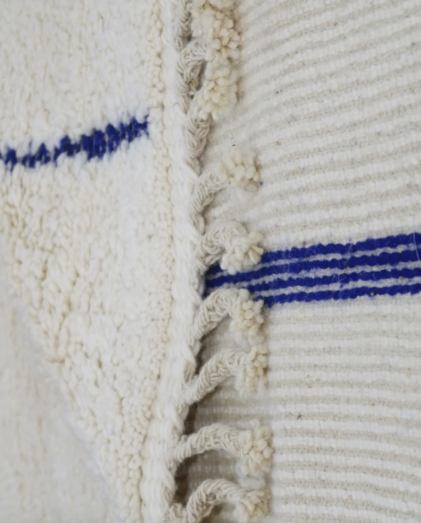 RADNA Azilal cream floating forms Moroccan rug back view showing traditional handwoven construction, by NURA