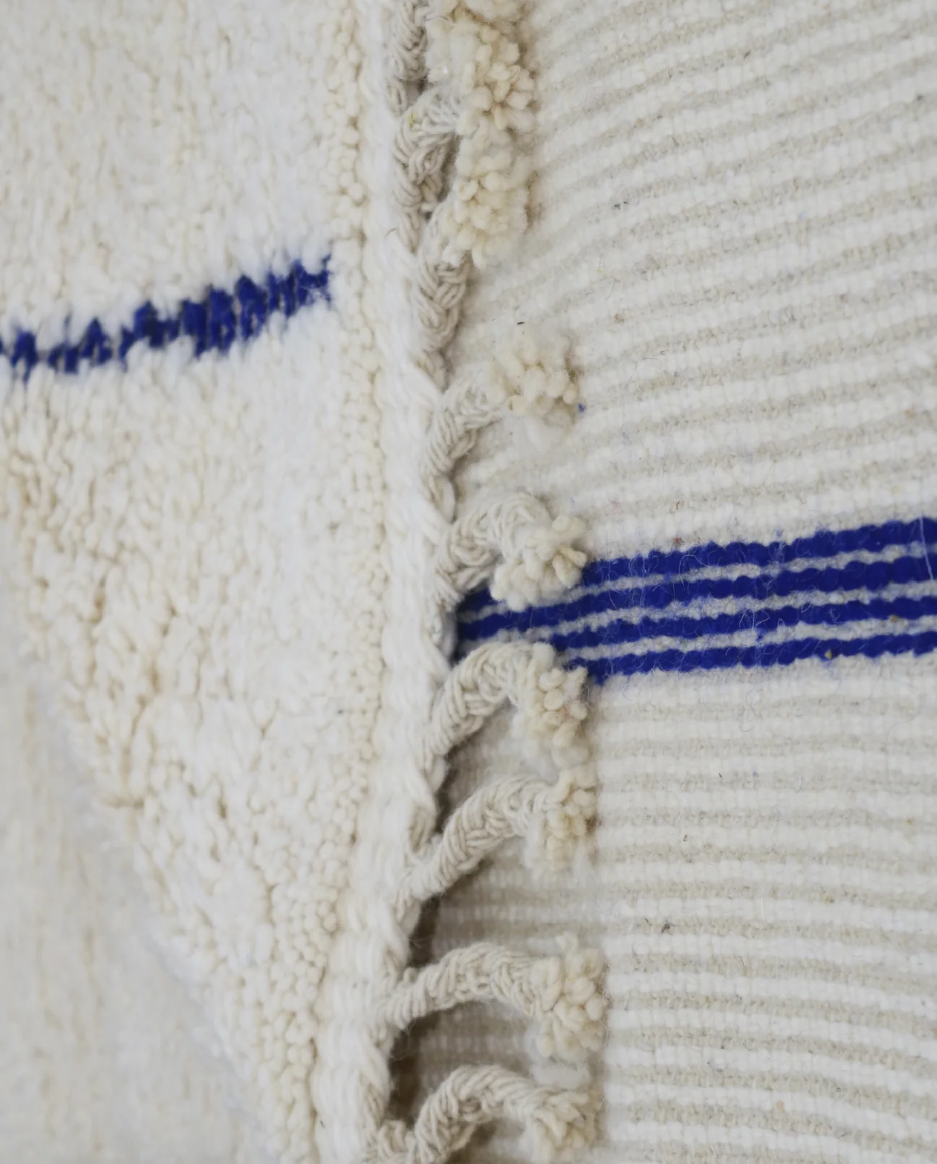 RADNA Azilal cream floating forms Moroccan rug back view showing traditional handwoven construction, by NURA