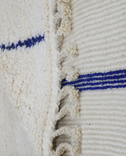 RADNA Azilal cream floating forms Moroccan rug back view showing traditional handwoven construction, by NURA
