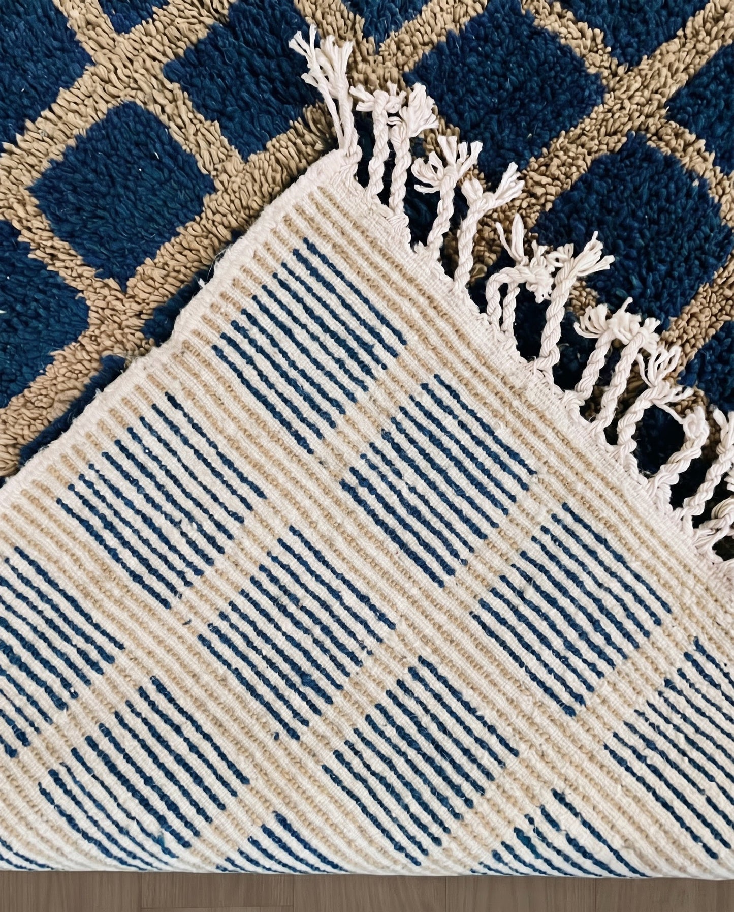 RAMA Beni Ourain navy checker grid Moroccan rug back view showing traditional handwoven construction, by NURA
