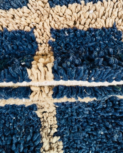 RAMA Beni Ourain navy checker grid Moroccan rug close-up showing hand-knotted wool texture and pile detail 2, by NURA