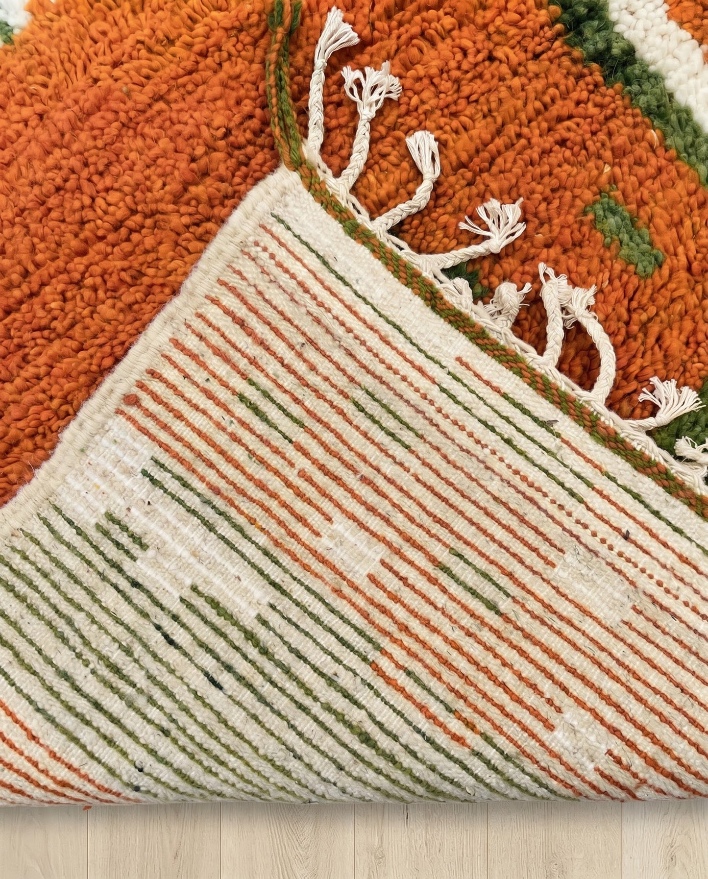 RIHANE Boujad rust organic abstract Moroccan rug back view showing traditional handwoven construction, by NURA