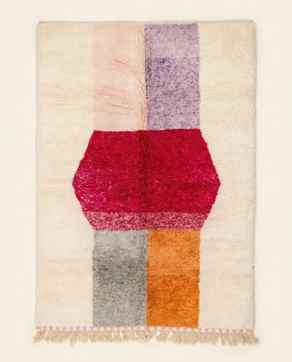Plush cream Azilal Moroccan rug with a bold abstract color block design in red, pink, and orange, by NURA.