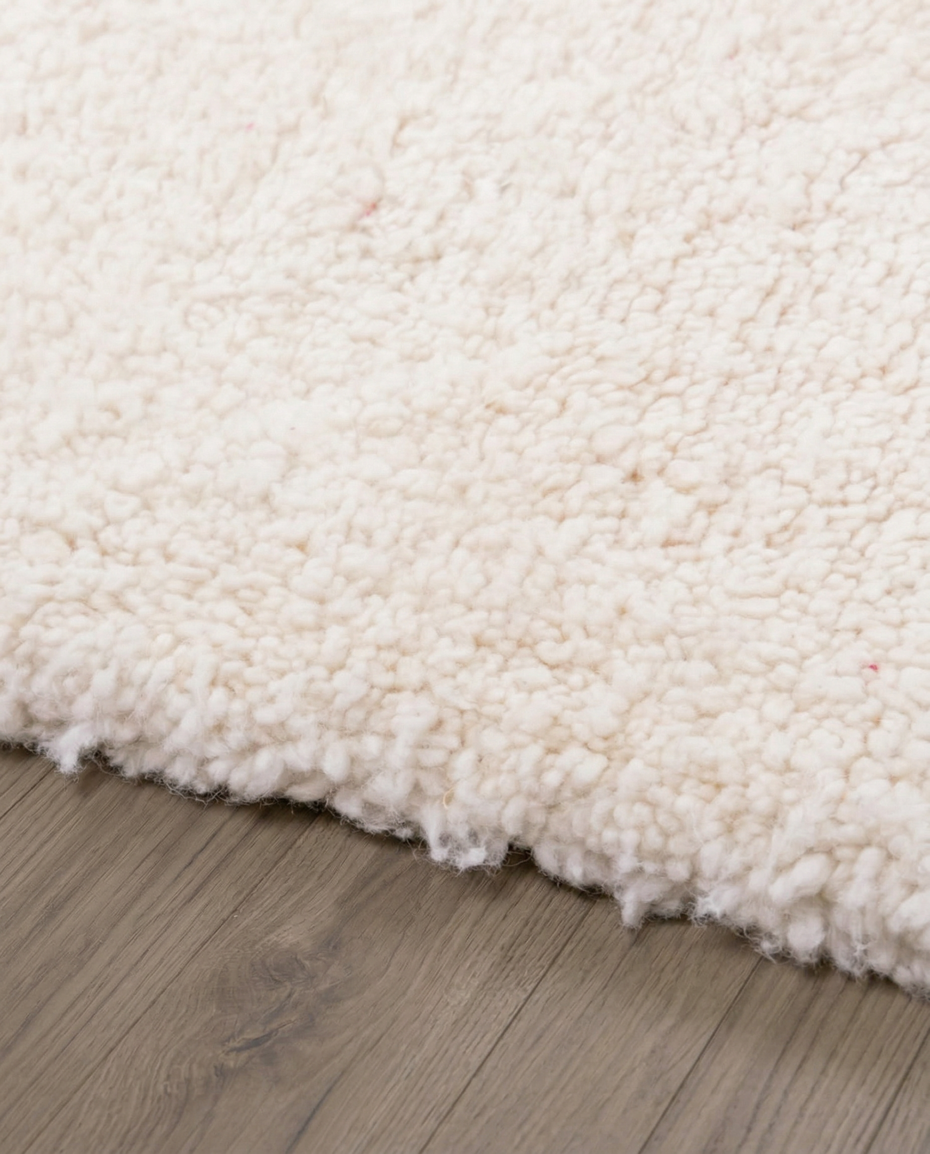 RITA Azilal cream abstract color block Moroccan rug close-up showing hand-knotted wool texture and pile detail 2, by NURA