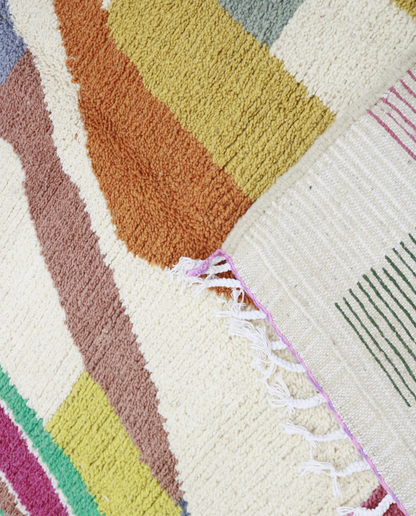 SABA Azilal cream organic abstract Moroccan rug back view showing traditional handwoven construction, by NURA