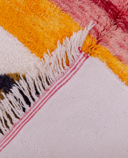 SABAH Azilal cream abstract central motif Moroccan rug back view showing traditional handwoven construction, by NURA