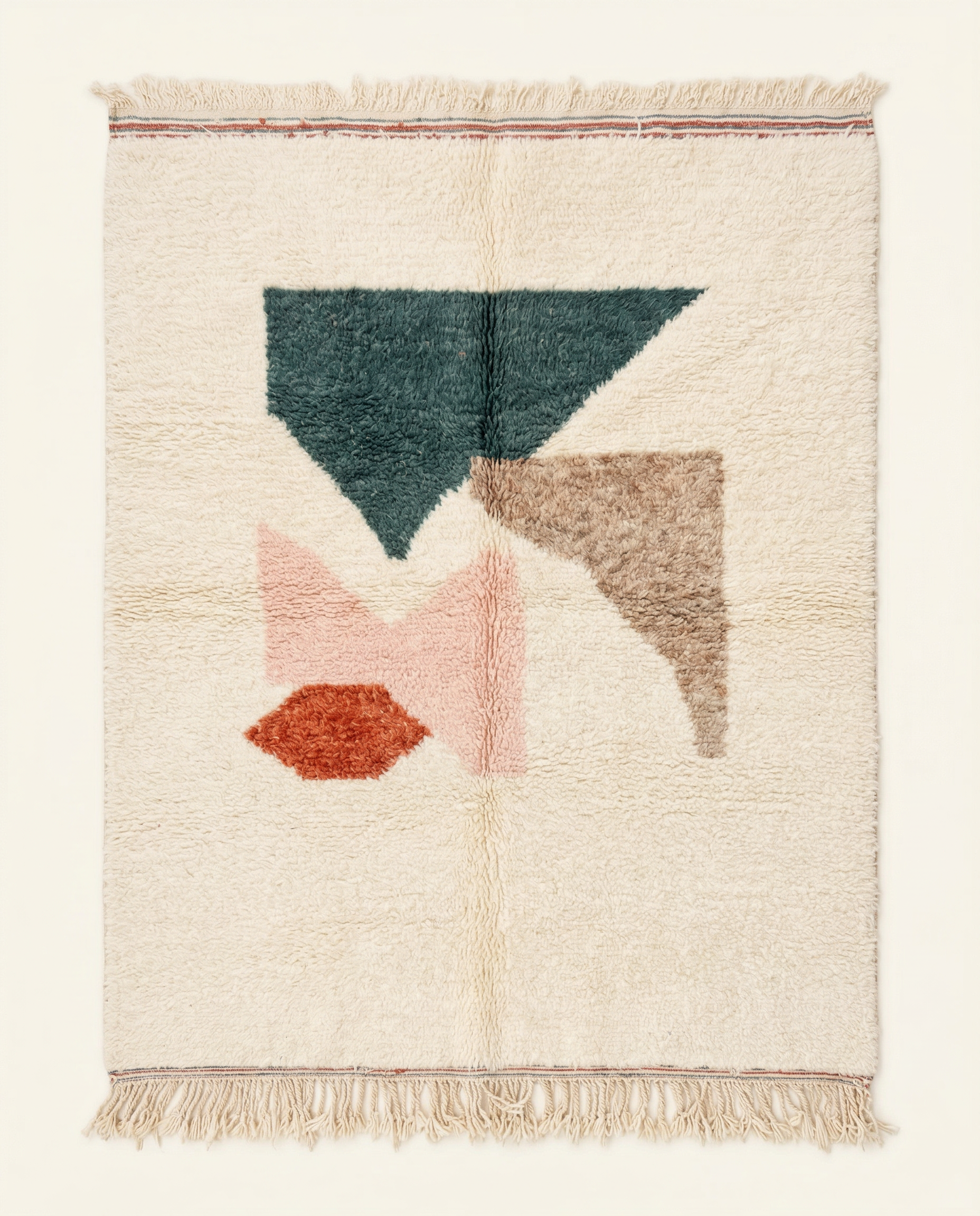Plush cream Azilal Moroccan rug with scattered large-scale abstract geometric shapes in muted teal, terracotta, and blush, by NURA.