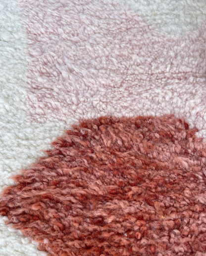 SABRINA Azilal cream abstract color block Moroccan rug close-up showing hand-knotted wool texture and pile detail, by NURA