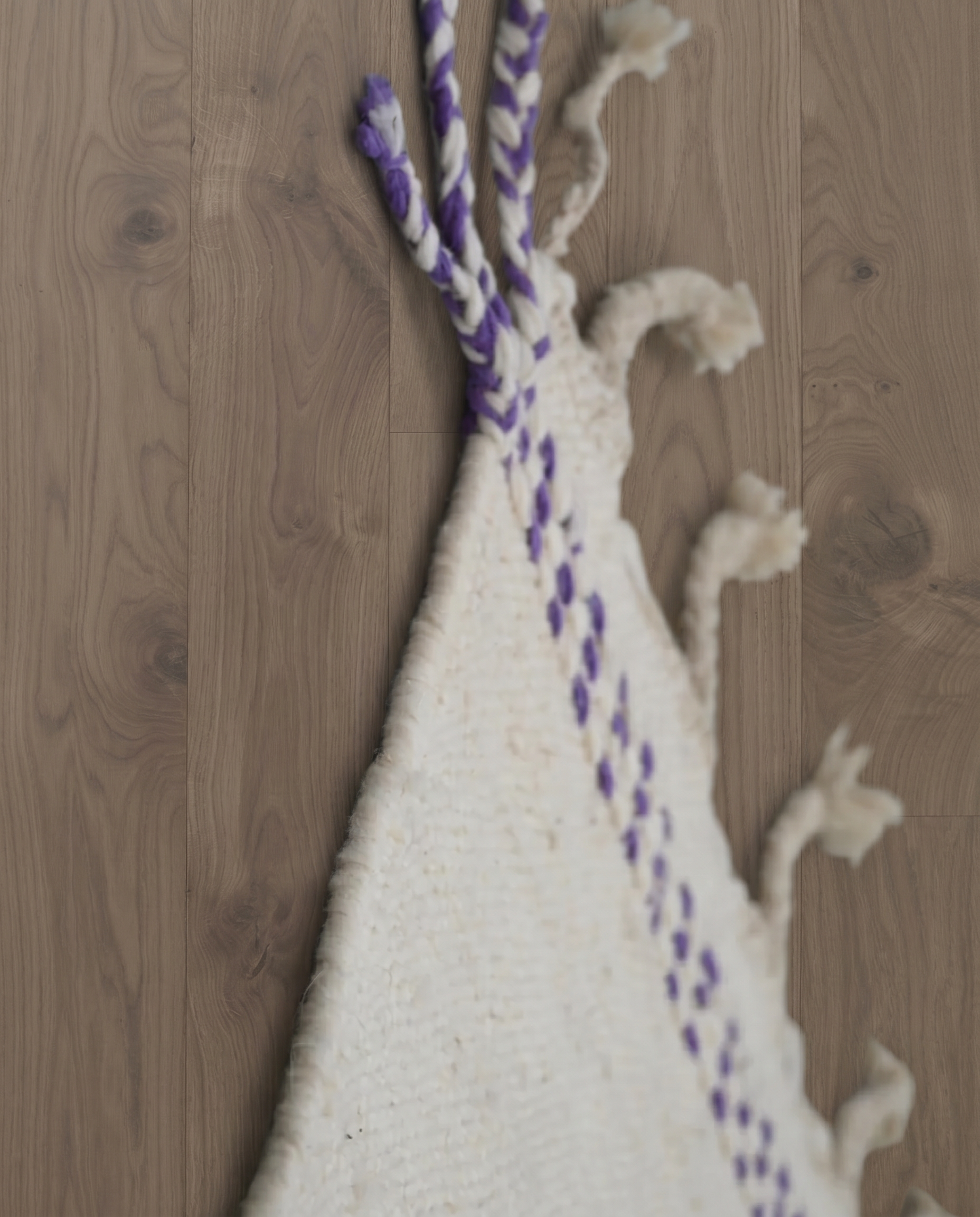 SADIA Azilal cream color block Moroccan rug close-up of hand-tied fringe and kilim band detail, by NURA