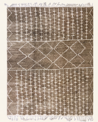 Plush taupe Beni Ourain Moroccan rug with a panelled ivory geometric design of crosses and diamonds in a high pile, by NURA.
