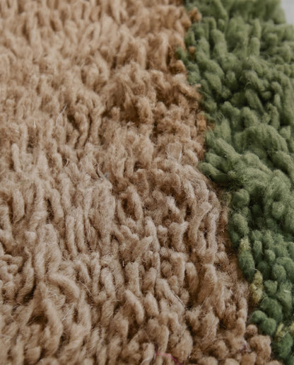SAIDA Beni Ourain beige bordered field Moroccan rug close-up showing hand-knotted wool texture and pile detail, by NURA