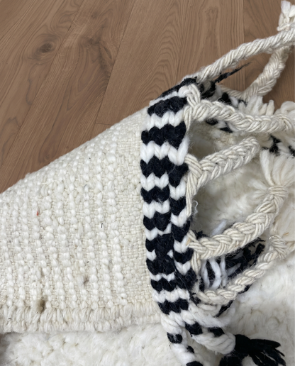 SALIMA Beni Ourain ivory open diamond motif Moroccan rug back view showing traditional handwoven construction, by NURA