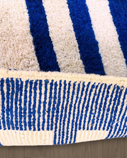 SAMIA Beni Ourain navy graphic arrow bands Moroccan rug close-up showing hand-knotted wool texture and pile detail 2, by NURA