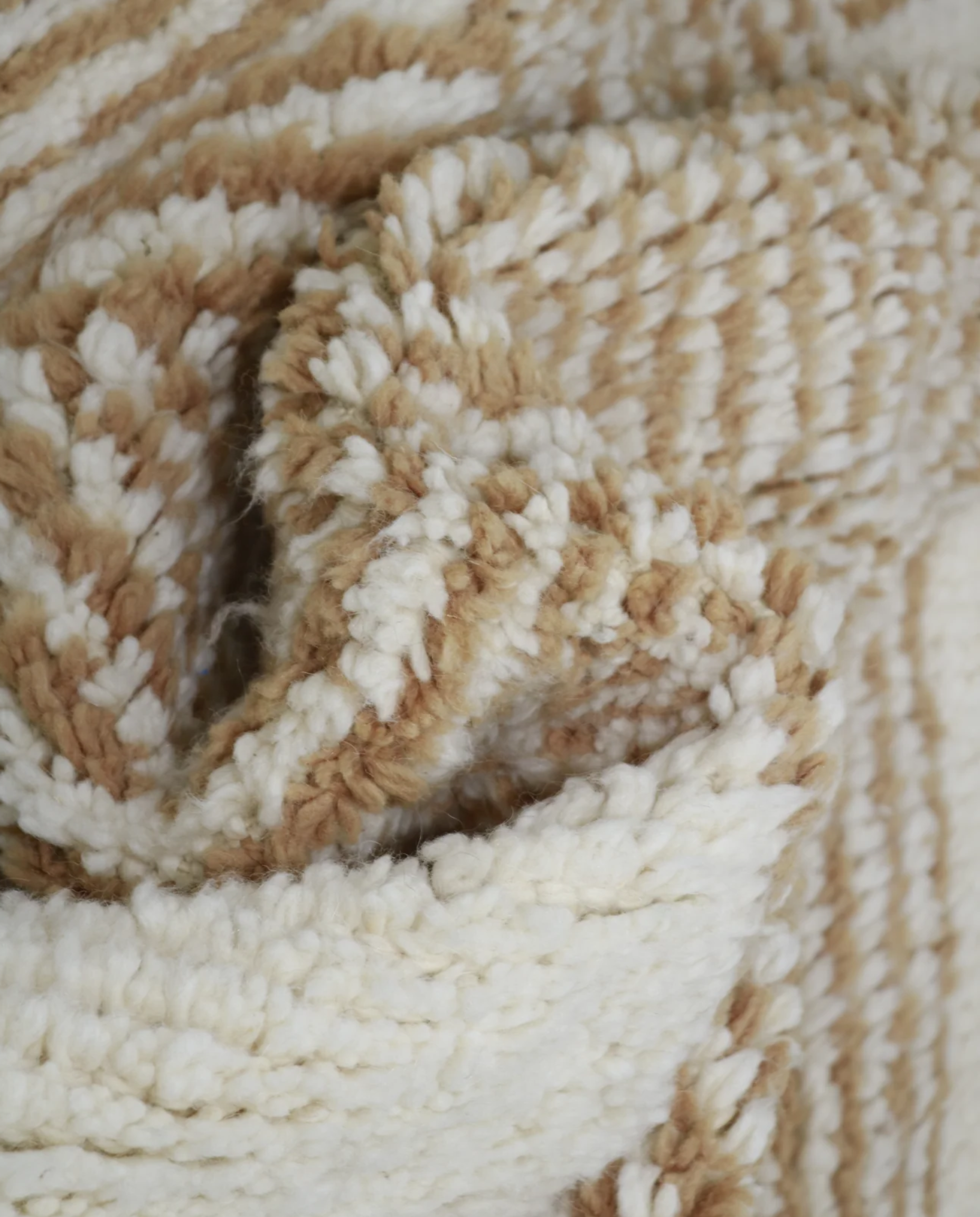 SAMIHA Beni Ourain cream floating forms Moroccan rug close-up showing hand-knotted wool texture and pile detail, by NURA
