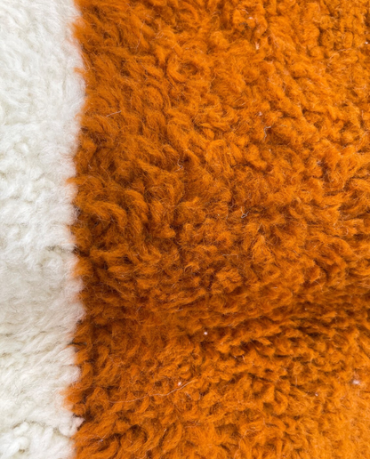 SARA Beni Ourain cream bold hourglass Moroccan rug close-up showing hand-knotted wool texture and pile detail 2, by NURA