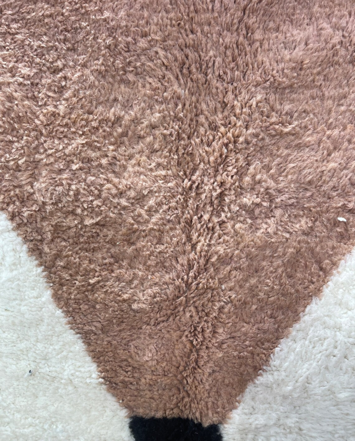 SARA Beni Ourain cream bold hourglass Moroccan rug close-up showing hand-knotted wool texture and pile detail, by NURA