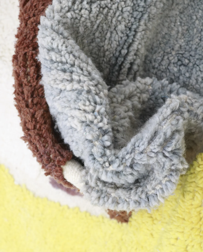 SEKINA Azilal cream abstract color block Moroccan rug close-up showing hand-knotted wool texture and pile detail 1, by NURA