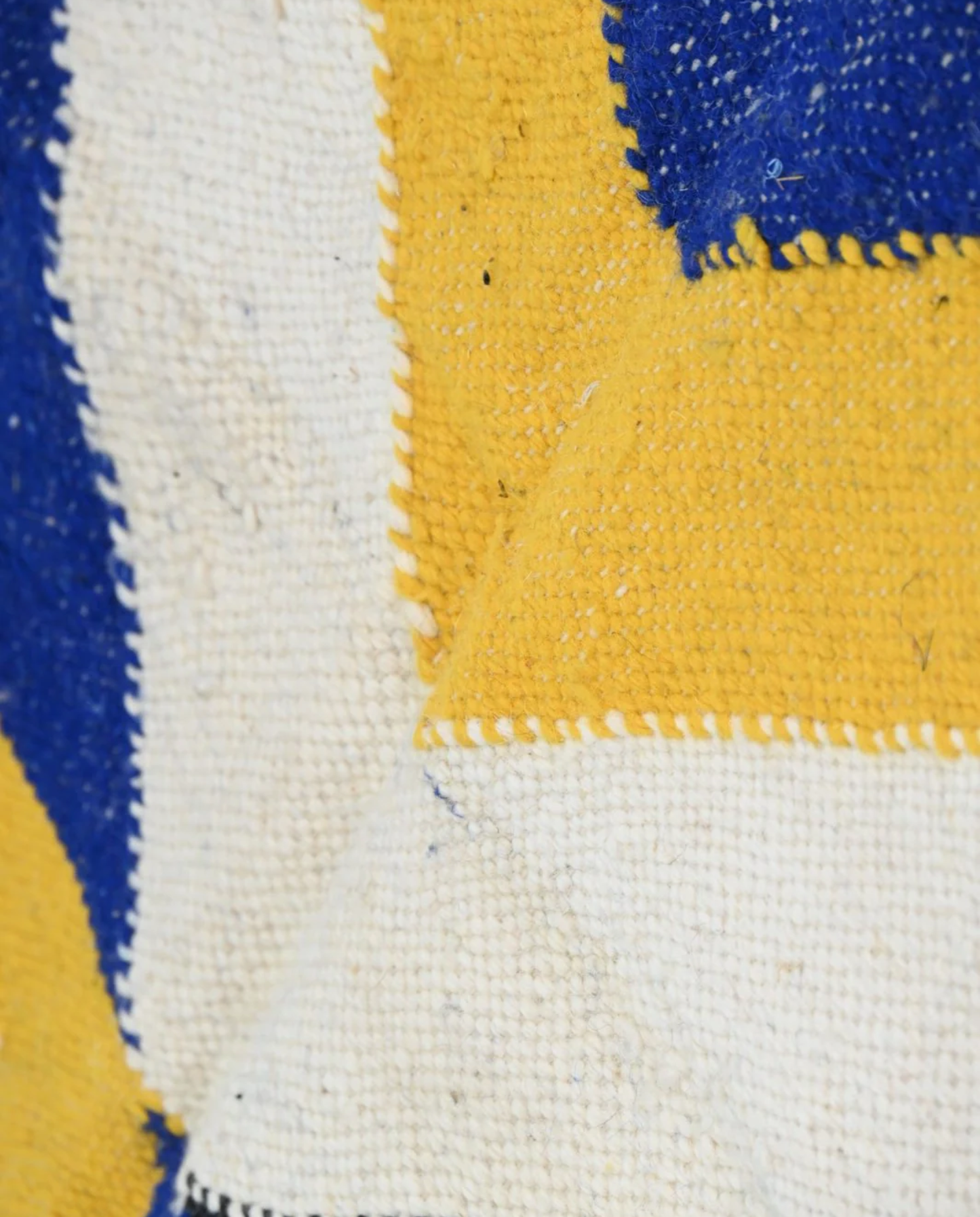 SENANA Taznakht mustard color block Moroccan rug close-up showing hand-knotted wool texture and pile detail 1, by NURA