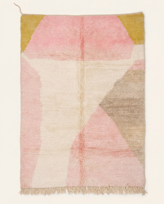 Plush ivory Azilal Moroccan rug with bold abstract color blocks in pink, mustard, and taupe, featuring a thick high pile, by NURA.