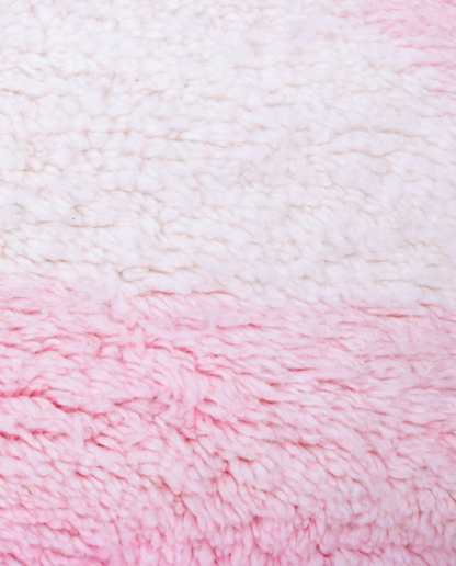 SILYA Azilal pink abstract color block Moroccan rug close-up showing hand-knotted wool texture and pile detail, by NURA