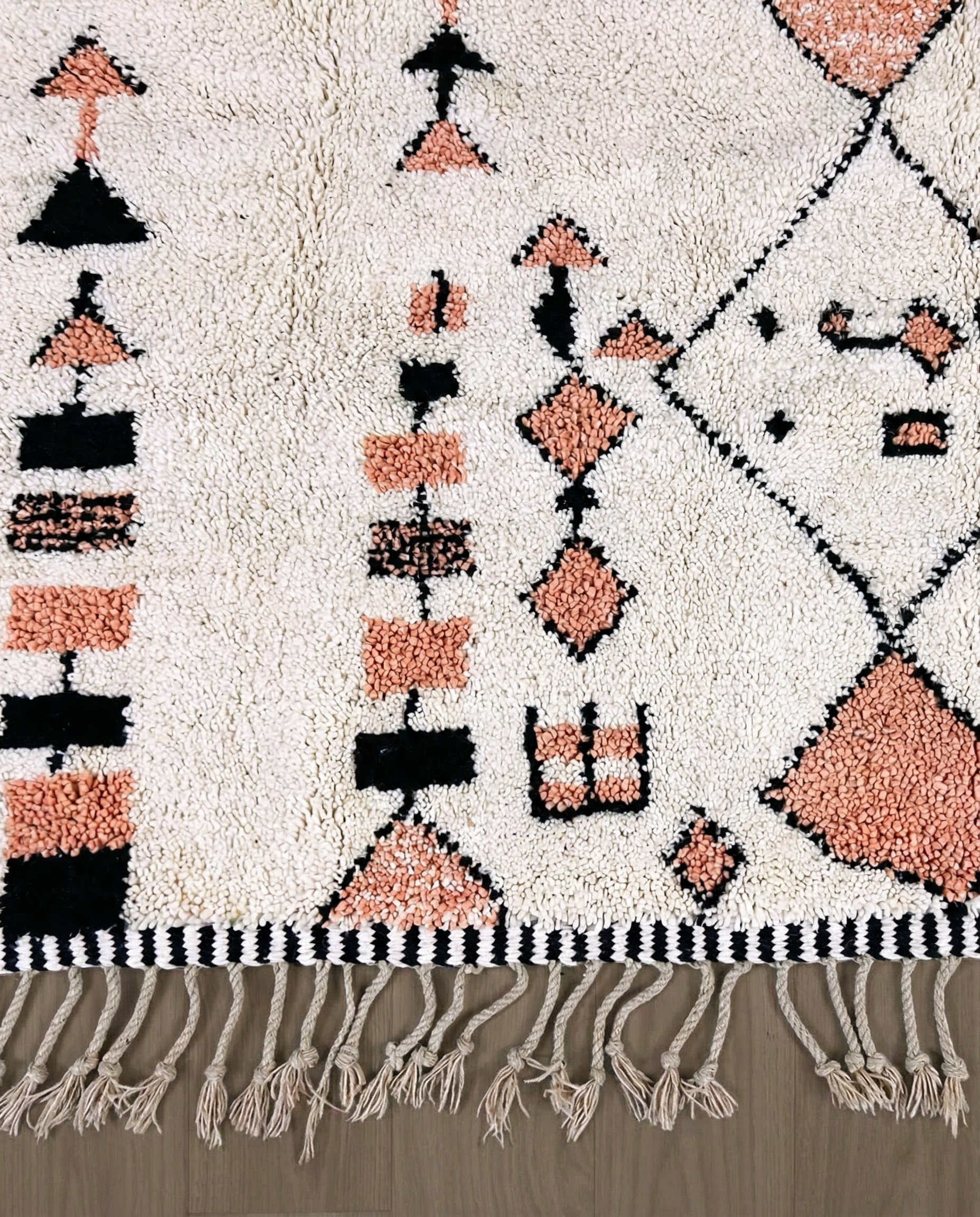 SOUHAILA Azilal cream scattered floating motifs Moroccan rug close-up of hand-tied fringe and kilim band detail, by NURA