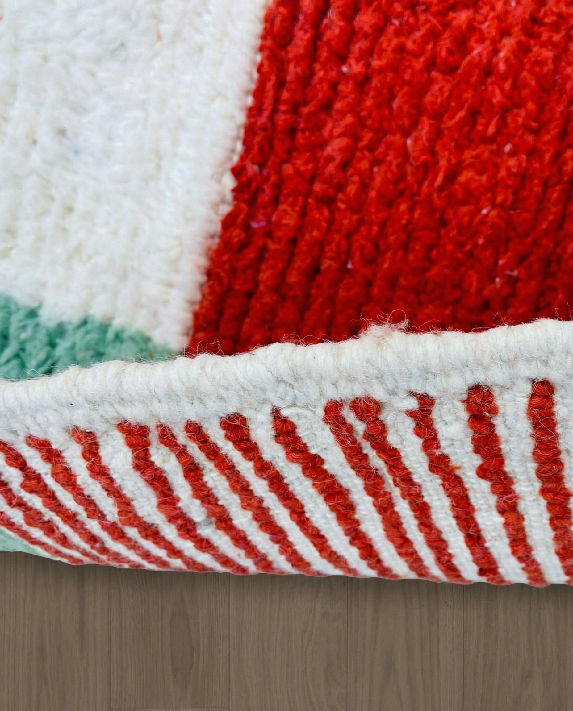 SOUKAINA Azilal cream abstract color block Moroccan rug close-up showing hand-knotted wool texture and pile detail 2, by NURA