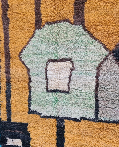 TALA Boujad mustard abstract color block Moroccan rug close-up showing hand-knotted wool texture and pile detail, by NURA